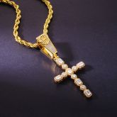Emerald and Round Cut Cross Pendant in Gold
