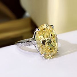 Oval Cut 4 Prong Yellow Stone Ring