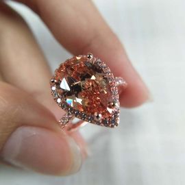 Halo Pear Cut Engagement Ring in Rose Gold