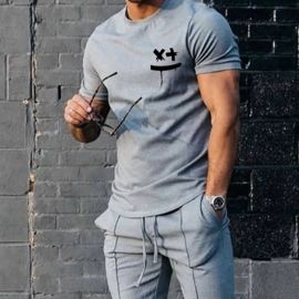 Spring And Summer Men's Short-sleeved T-shirt + Solid Color Sports Pants Two-piece Set