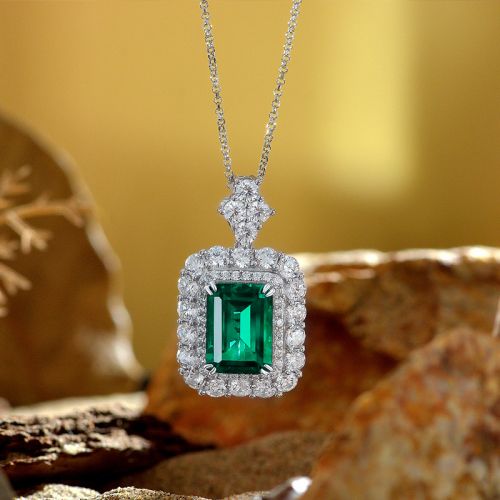 Luxurious Green Emerald Cut Double Halo Sterling Silver Pendant